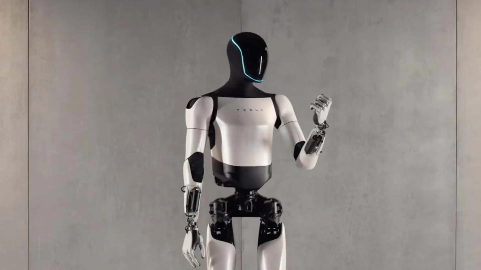 Tesla Optimus humanoid robot, black-and-white, Tesla wordmark on the chest